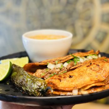 Mexitli Restuarant signature dishes Carne Asada TacoBirria TacoAsada Quesadilla